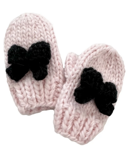 Pink Baby Mittens With A Black Bow